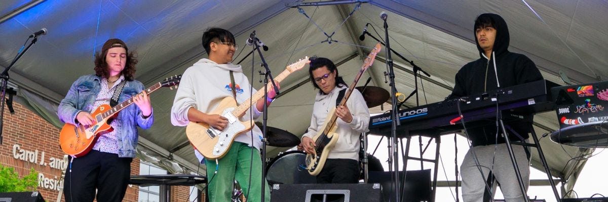2024 Innovation Expo music and technology Concert, showing four students in a band