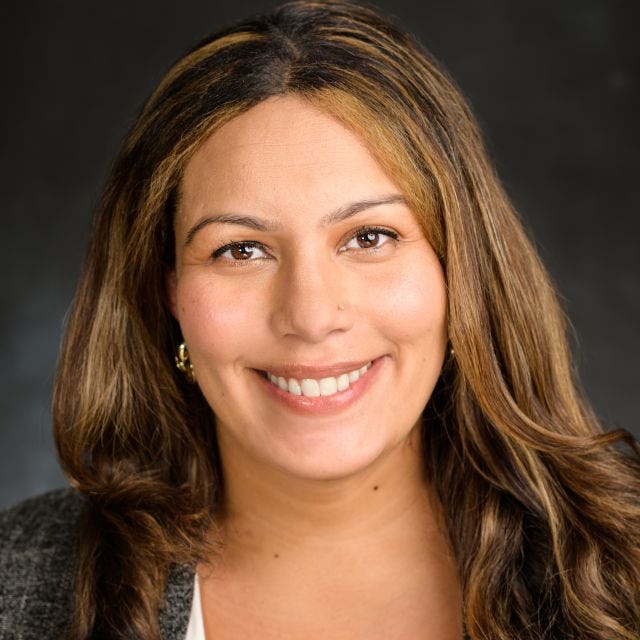 A headshot of Karla Medina, our Senior Director of Marketing