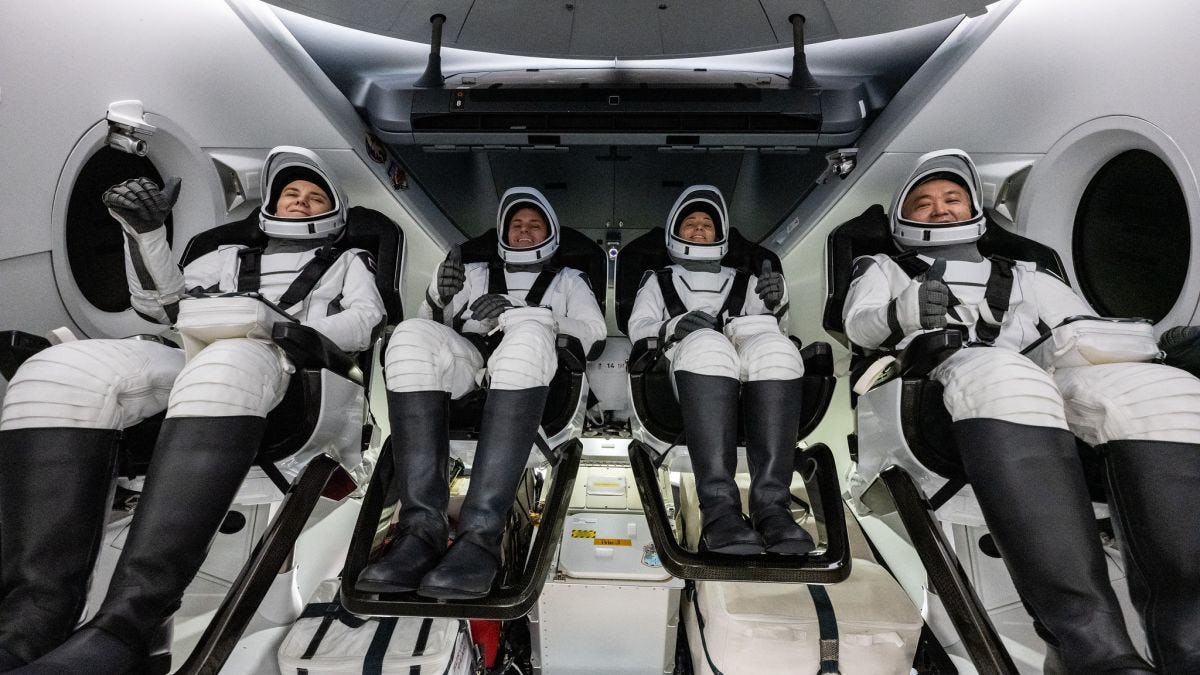 Four crew members in space station