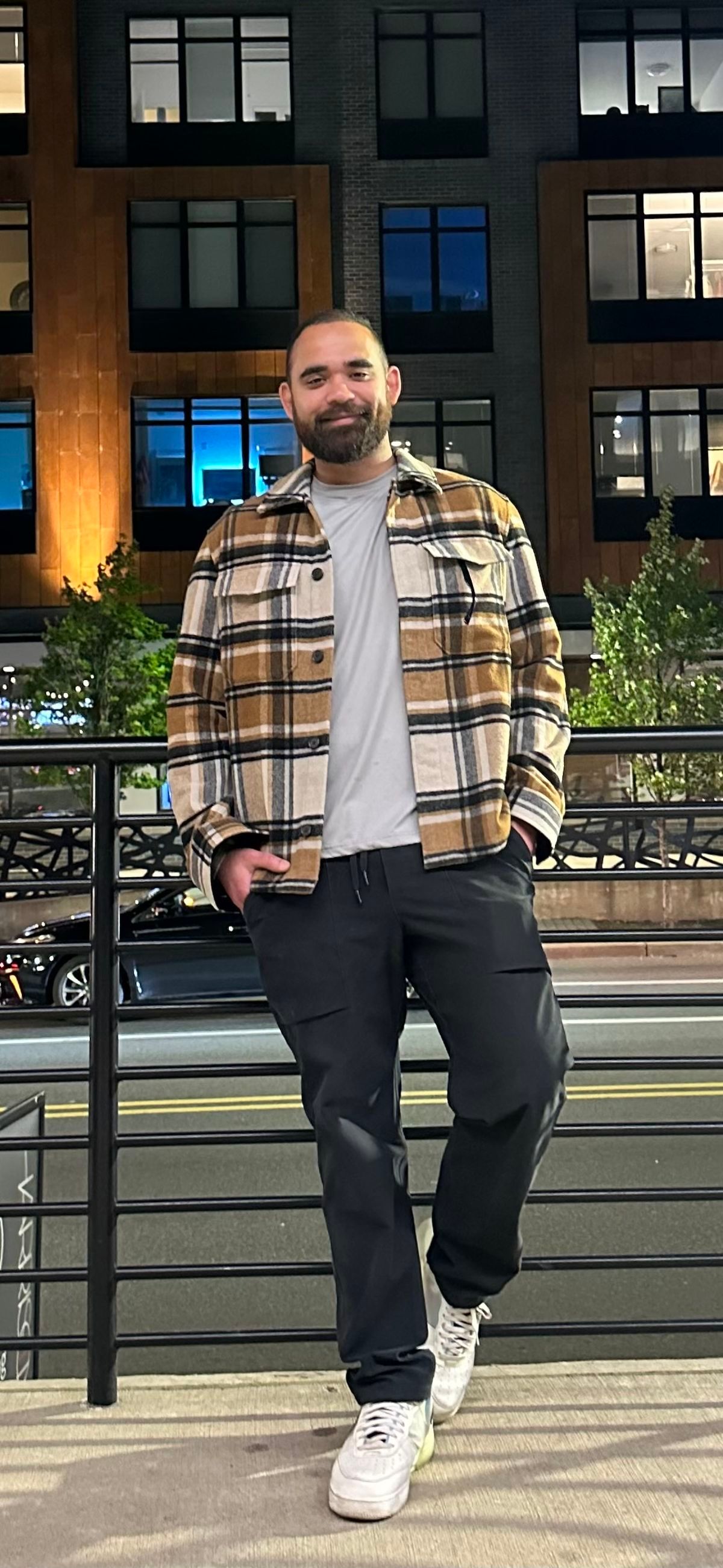 Rohan Chathrath standing in front of a building.