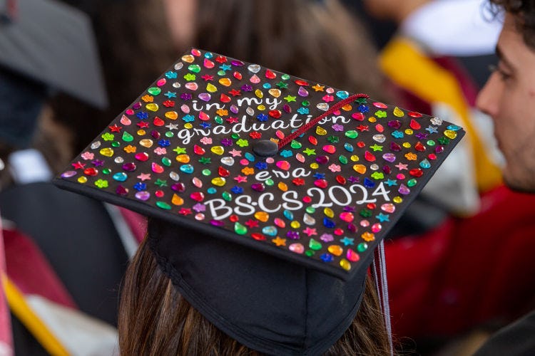A Commencement cap decorated with "In my graduation era"
