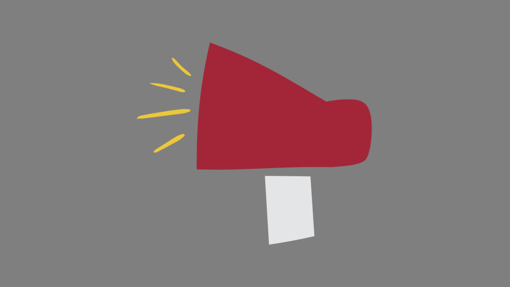 Picture of a red and light gray megaphone in front of a dark gray background 